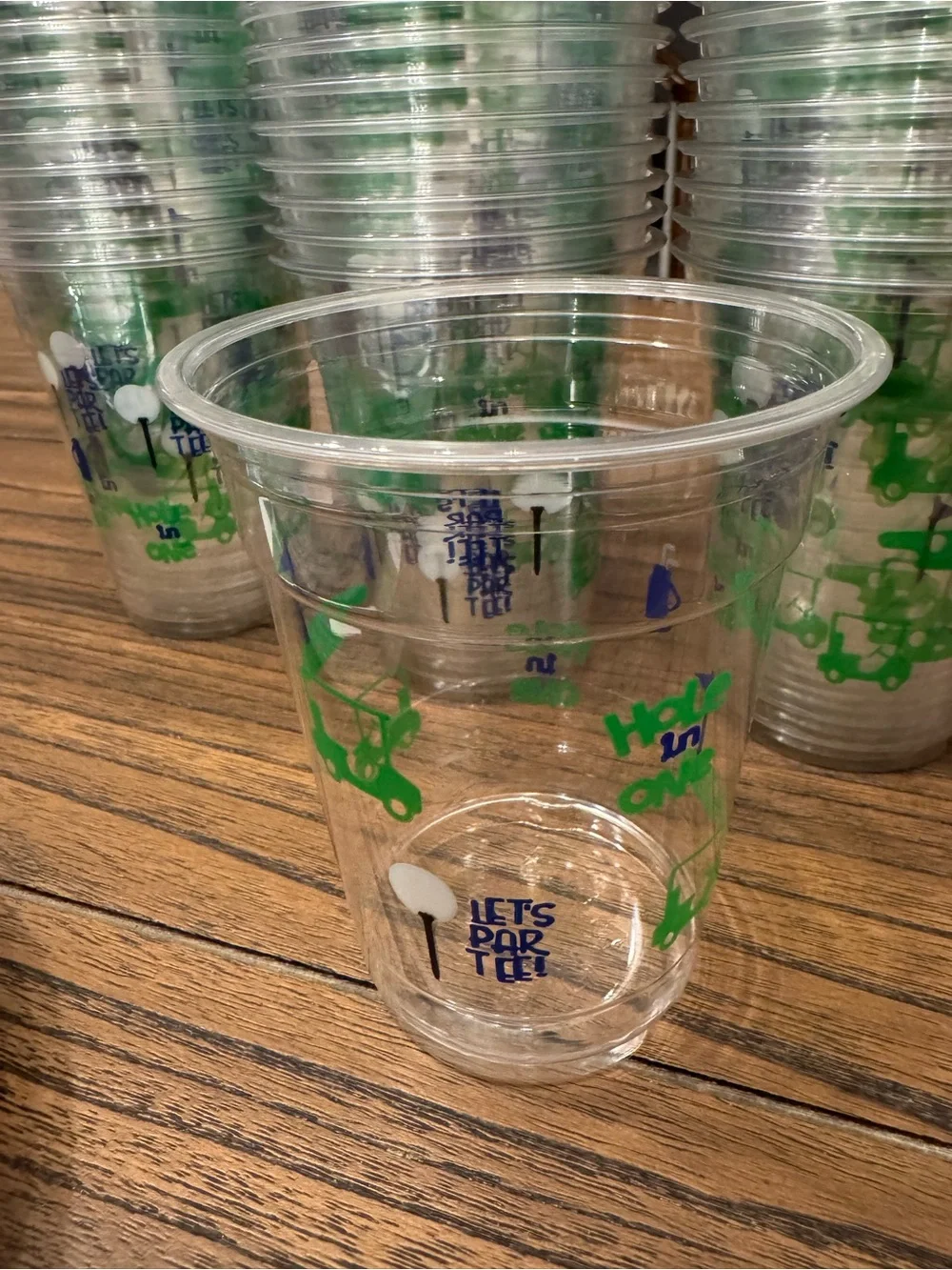 Golf theme paper plates (30 of each) and plastic cups (60)